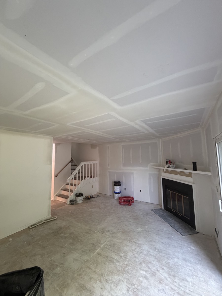 After photo of living room ceiling and walls finished with drywall by KPX in Shelton CT