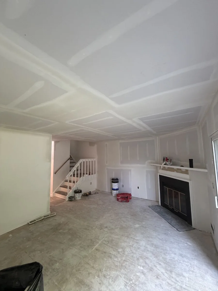 After photo of living room ceiling and walls finished with drywall by KPX in Shelton CT